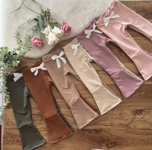 Spodnie DZWONY z kokardką koronka