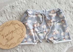 Krótkie spodenki DINOZAURY Z WULKANEM 